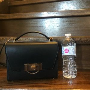 crossbody purse by Charles and Keith